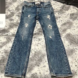 Size 13/14 boys Abercrombie jeans one in black one in white and another in blue.